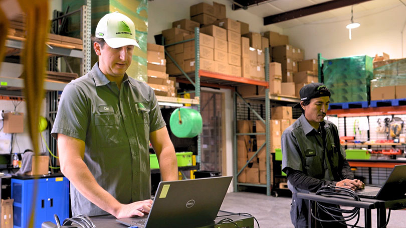 Shipping manager Carl checking batteries.